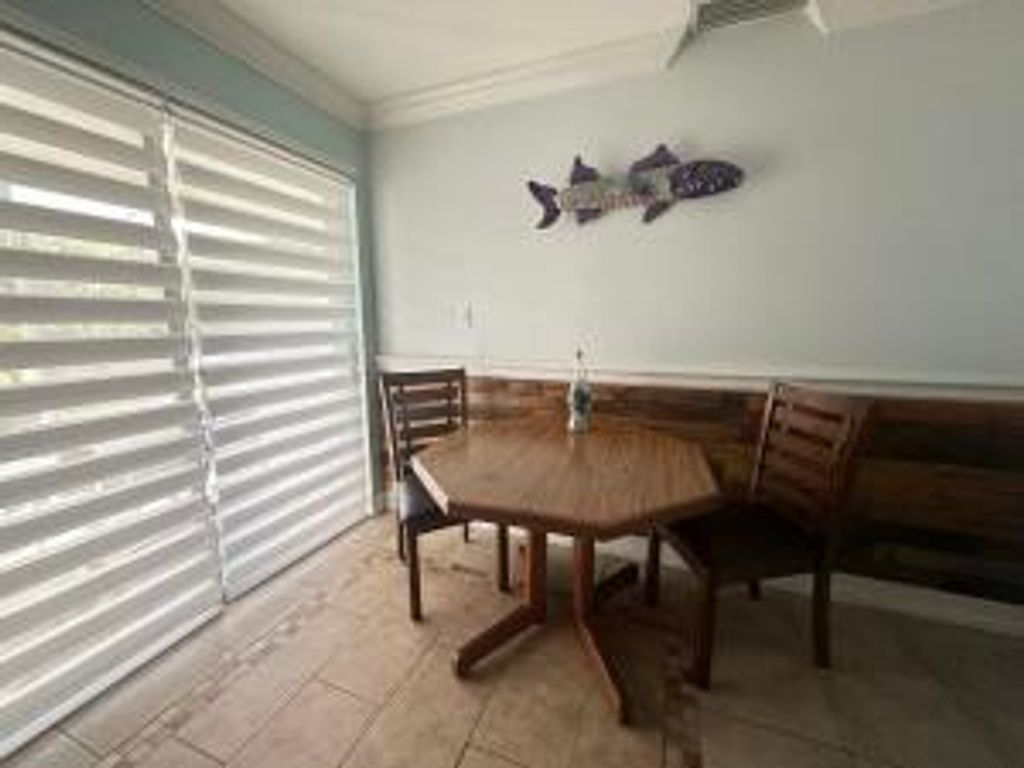 Photo of 732 Granada Street #Apt A, Hutchinson Island, FL 34949 (MLS # R11165830)