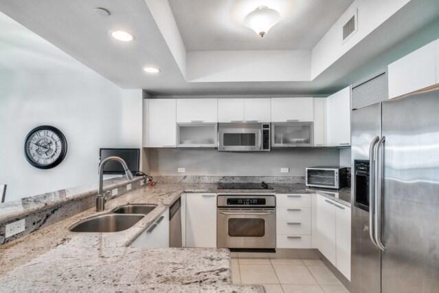 MARINA GRANDE RIVIERA BEACH CONDO - Residential Lease