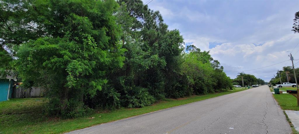3 lots in a row in desirable Indian River Estates. Come build your dream home or 3 homes on this beautiful 3/4 acre parcel. No HOA. Located conveniently near restaurants, shopping, medical facilities, and the beach.