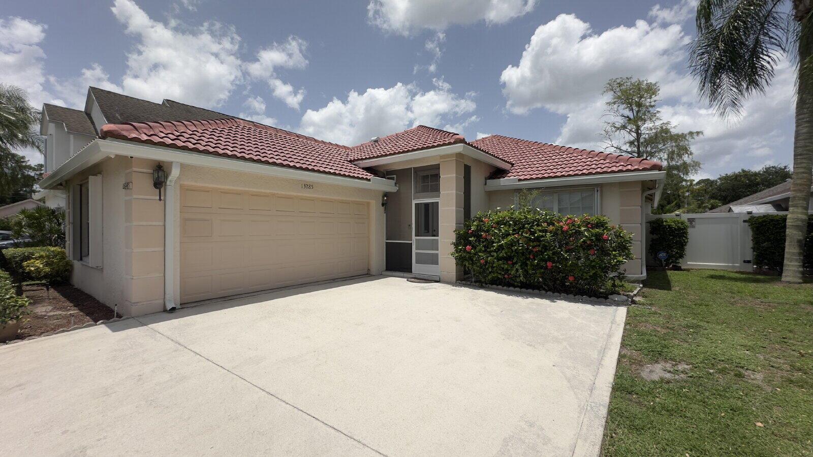 LOCATED IN WELLINGTON IN THE SOUGHT AFTER COMMUNITY OF EMERALD FOREST - UPDATED SINGLE FAMILY THREE BEDROOM TWO BATH TWO CAR GARAGE HOME. NEW VINYL FLOORING THROUGHOUT. KITCHEN FEATURES PLENTY OF WOOD CABINETRY, QUARTZ COUNTERTOPS / BACKSPLASH, STAINLESS APPLIANCES WITH SLIDER TO SCREENED IN PATIO. OPEN CONCEPT LIVING / DINING AREA. MASTER ENSUITE WITH UPDATED BATH OFFERING LARGE WALK IN SHOWER AND DUAL SINKS. TWO GUEST BEDROOMS AND BATH WITH SHOWER / TUB COMBINATION. SPACIOUS UPDATED LAUNDRY ROOM WITH QUARTZ COUNTERTOP, WHITE CABINETRY, AND FULL-SIZE WASHER / DRYER. CONVENIENTLY LOCATED NEAR RESTAURANTS, SHOPPING, AND ENTERTAINMENT.