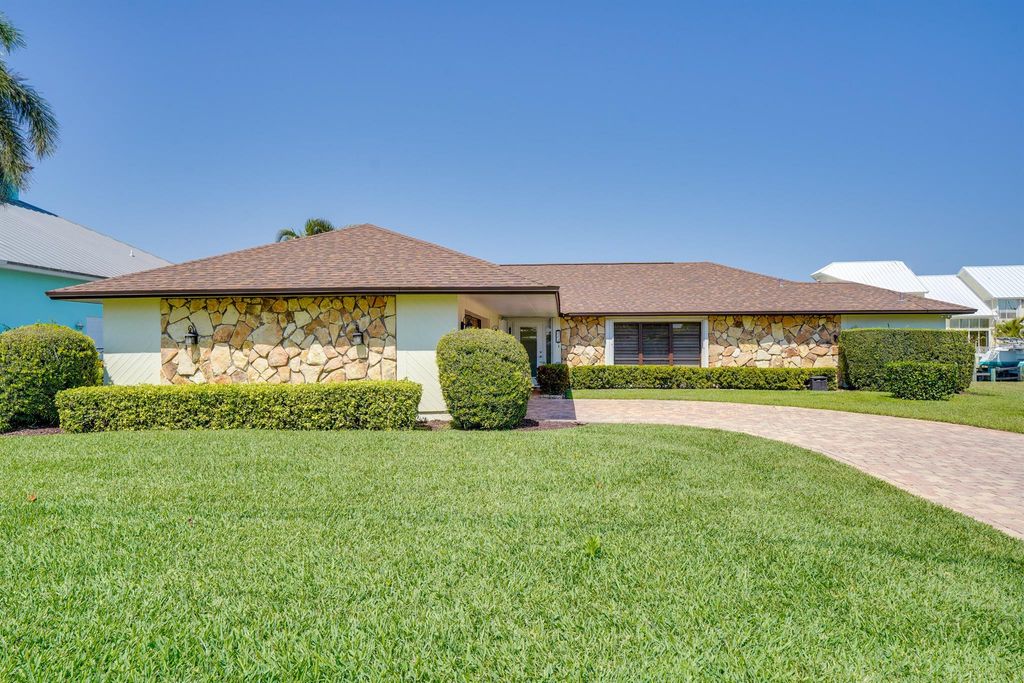 Photo of 272 Bermuda Beach Drive, Fort Pierce, FL 34949 (MLS # R11070847)