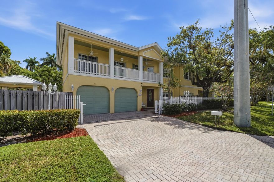 Big 3-bedroom, 2.5-bath townhome with automatic gate & 2 car garage that lives like a single-family home with direct access from your unit to the pool and outdoor kitchen and grills. The home has a Gas range, stainless steel appliances, granite countertops, solid wood cabinetry, and both wall and convection ovens. The expansive living room offers high ceilings and fireplace, creating a warm and inviting atmosphere. Office / den or playroom off the kitchen. The generous primary suite includes a walk-in closet and a full-length balcony overlooking the water, offering beautiful sunset views. Additional highlights include second-floor laundry, a two-car garage, metal roof, impact windows, plantation shutters, marble and wood flooring and more. Come check this unique townhouse out today!