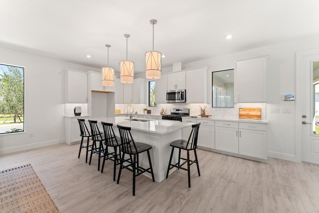 Photo of 950 SW Prairie Avenue, Palm City, FL 34990 (MLS # R11035065)