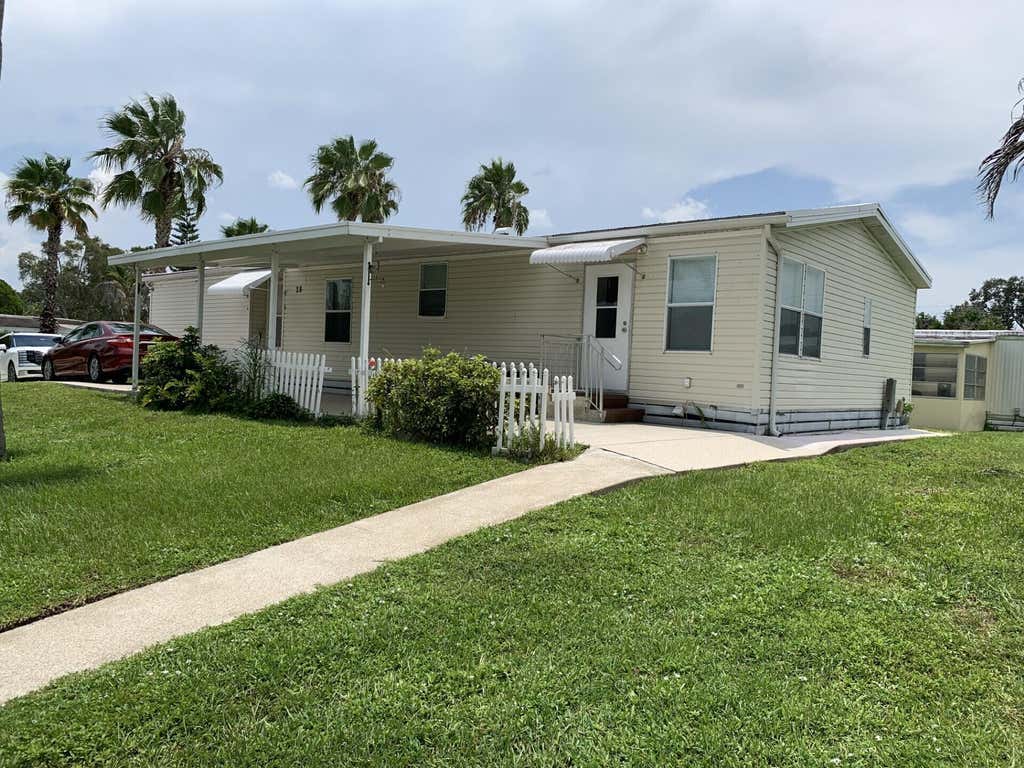 Photo of 28 SE Flamenco Way, Port Saint Lucie, FL 34952 (MLS # B26057997)