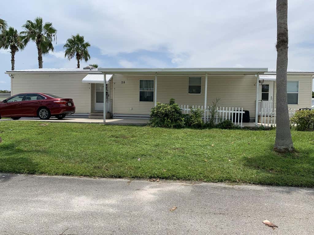Photo of 28 SE Flamenco Way, Port Saint Lucie, FL 34952 (MLS # B26057997)