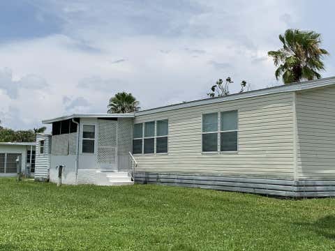 Photo of 28 SE Flamenco Way, Port Saint Lucie, FL 34952 (MLS # B26057997)