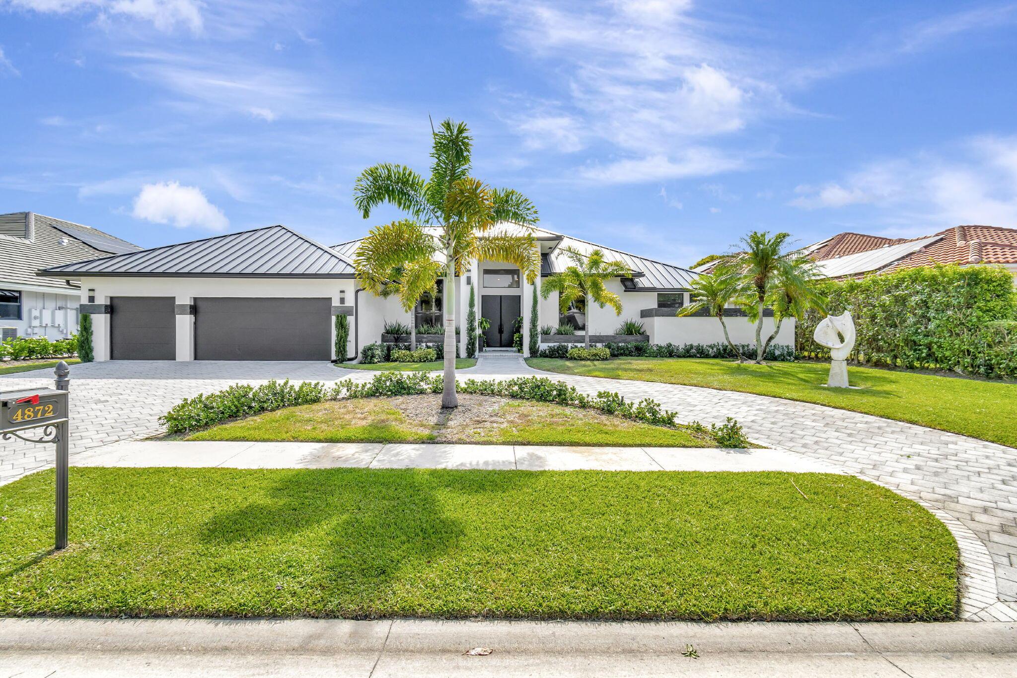 This captivating house offers an exceptional living experience, seamlessly blending sophistication and modern comforts. Nestled within the prestigious Bocaire Country Club community, this stunning residence boasts four bedrooms and four bathrooms, providing ample space and remarkable features.As you enter inside, you'll be greeted by an open-concept layout that effortlessly connects the kitchen, family room, dining room, and living room. The kitchen is a true highlight, featuring a stunning quartzite countertop imported from Italy and all-new state-of-the-art appliances. The convenient kitchen island further enhances the functionality and flow of this inviting space.The home's interior has been meticulously maintained, with recently refinished flooring that creates a cohesive and