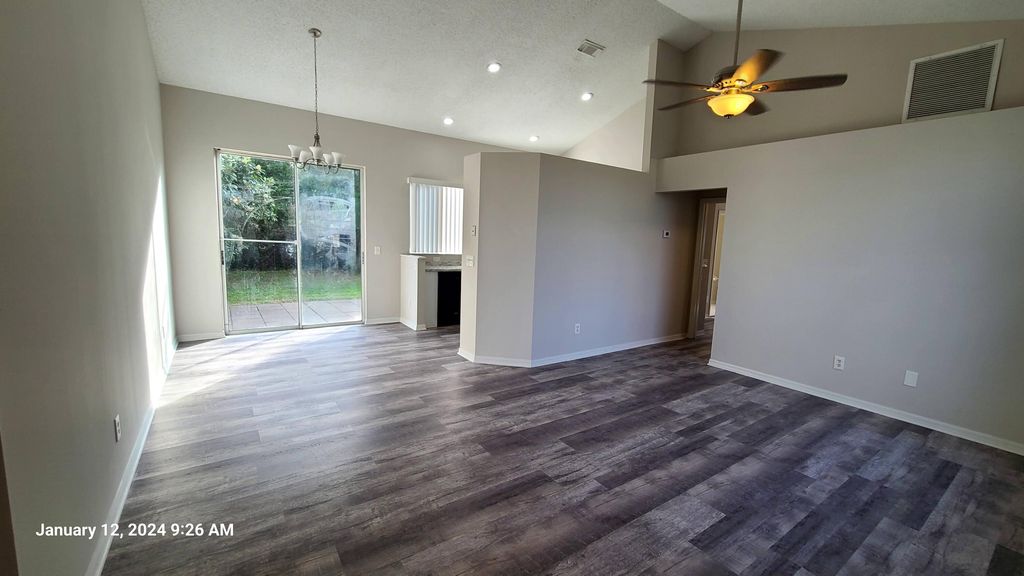 Photo of 3051 SW Briggs Street, Port Saint Lucie, FL 34953 (MLS # R10949578)