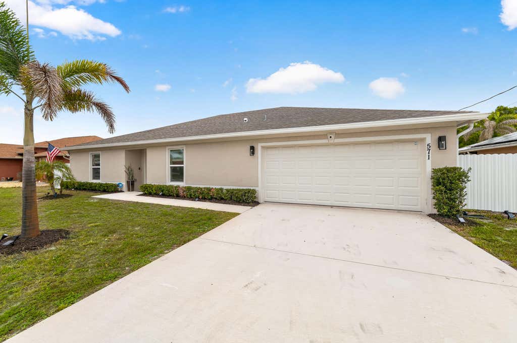 Photo of 571 SW Lairo Avenue, Port Saint Lucie, FL 34953 (MLS # B26030510)