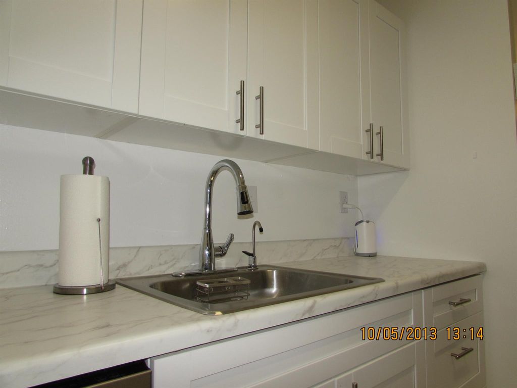 Photo of 1141 Lake Victoria Drive #F, West Palm Beach, FL 33411 (MLS # R11146642)