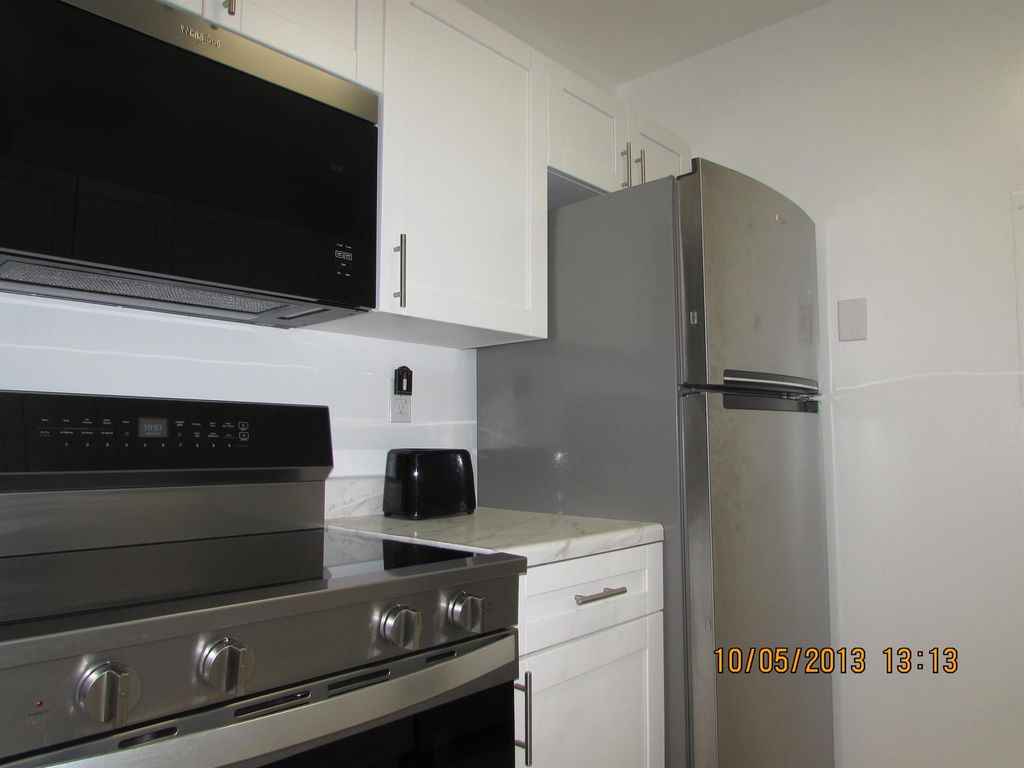 Photo of 1141 Lake Victoria Drive #F, West Palm Beach, FL 33411 (MLS # R11146642)