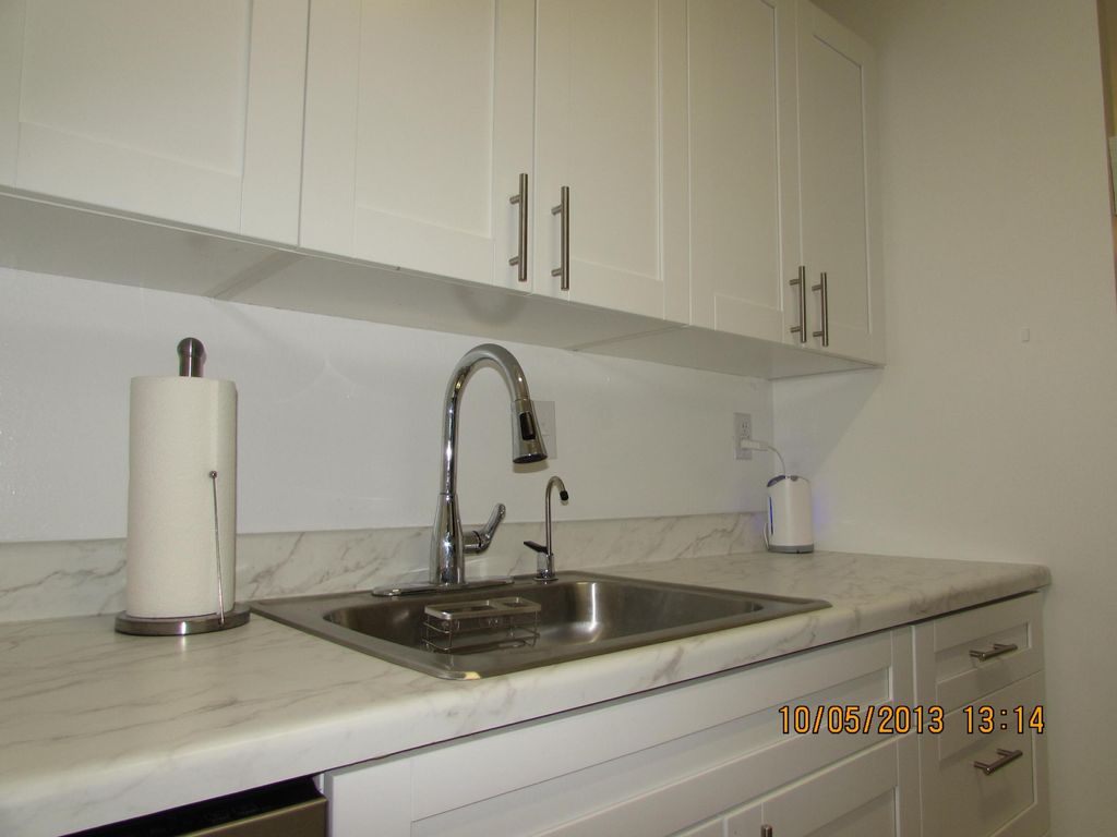 Photo of 1141 Lake Victoria Drive #F, West Palm Beach, FL 33411 (MLS # R11146642)