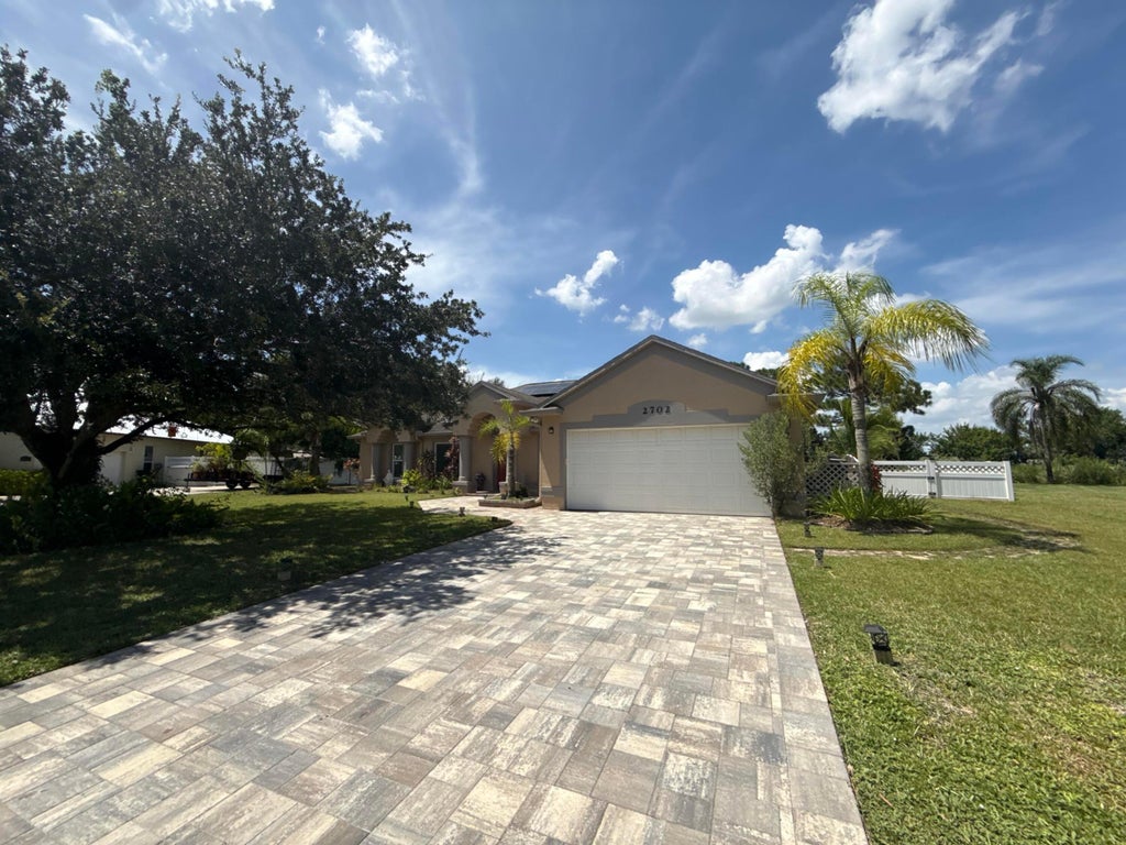 Photo of 2702 SERENITY Circle N, Fort Pierce, FL 34981 (MLS # B26078958)