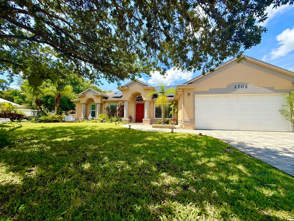 Photo of 2702 SERENITY Circle N, Fort Pierce, FL 34981 (MLS # B26078958)