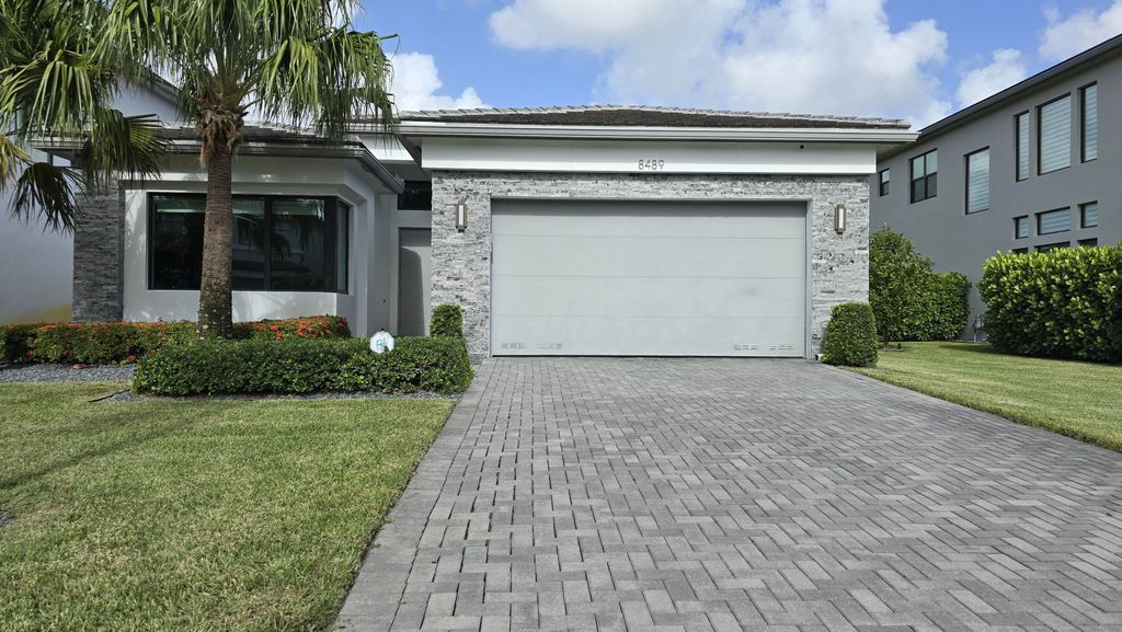 Photo of 8489 Apple Falls Lane, Boca Raton, FL 33496 (MLS # R11111298)