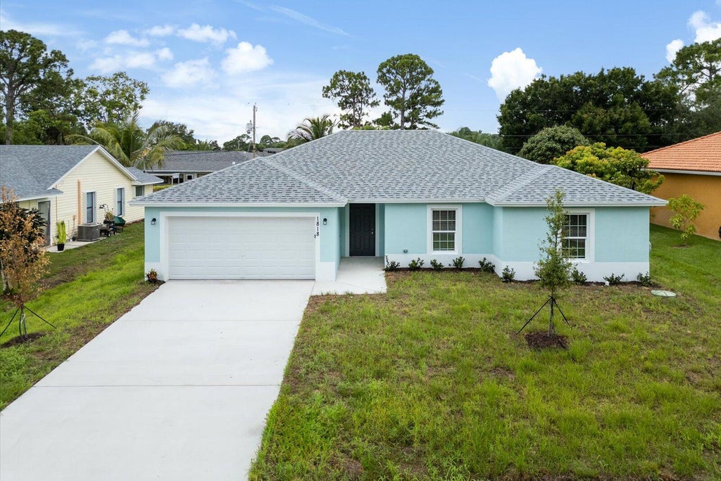 Photo of 1818 SW Bellevue Avenue, Port Saint Lucie, FL 34953 (MLS # R10983335)