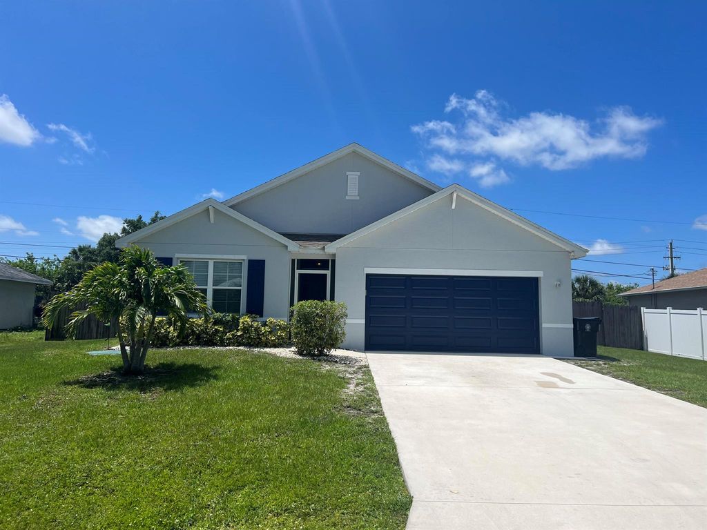 Photo of 110 SW Ridgecrest Drive, Port St Lucie, FL 34953 (MLS # R10892864)