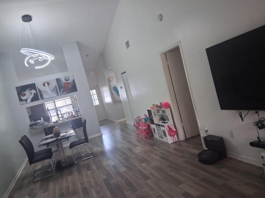 Photo of 1200 PARKSIDE GREEN Drive #E, Greenacres, FL 33415 (MLS # B26077466)