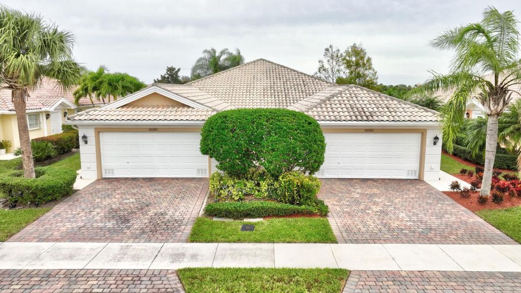 Photo of 12050 SW Elsinore Drive, Port Saint Lucie, FL 34987 (MLS # R10943370)