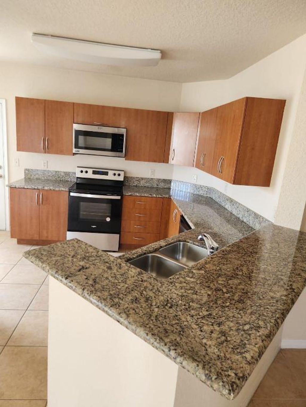 Photo of 130 SW Peacock Boulevard #201, Port Saint Lucie, FL 34986 (MLS # R10957662)