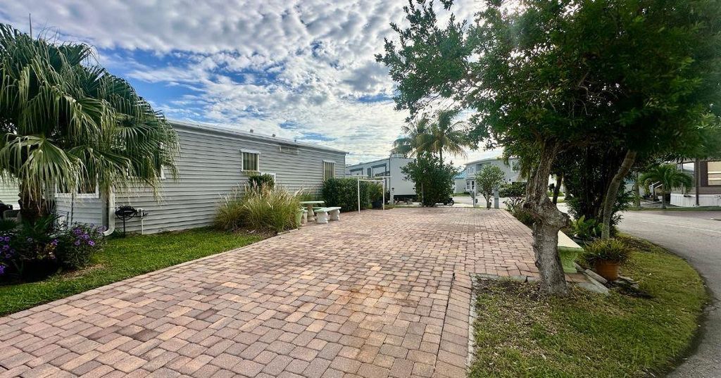 Photo of 305 Nettles Boulevard, Jensen Beach, FL 34957 (MLS # F10518669)