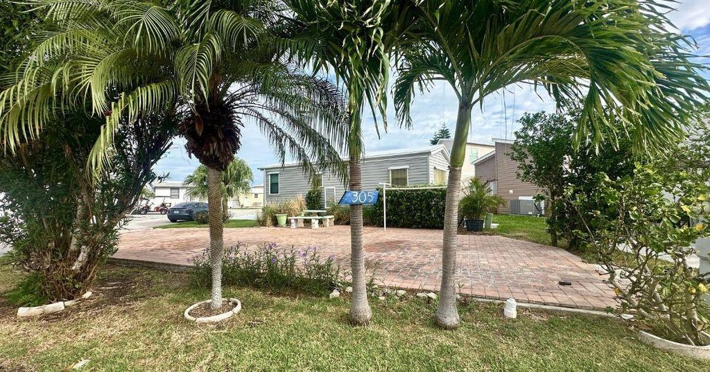 Photo of 305 Nettles Boulevard, Jensen Beach, FL 34957 (MLS # F10518669)