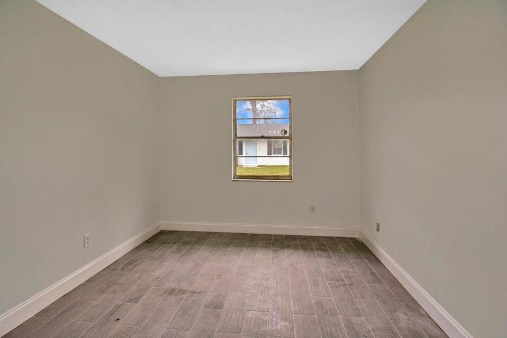 Photo of 3050 Martin Avenue, Greenacres, FL 33463 (MLS # R11147239)