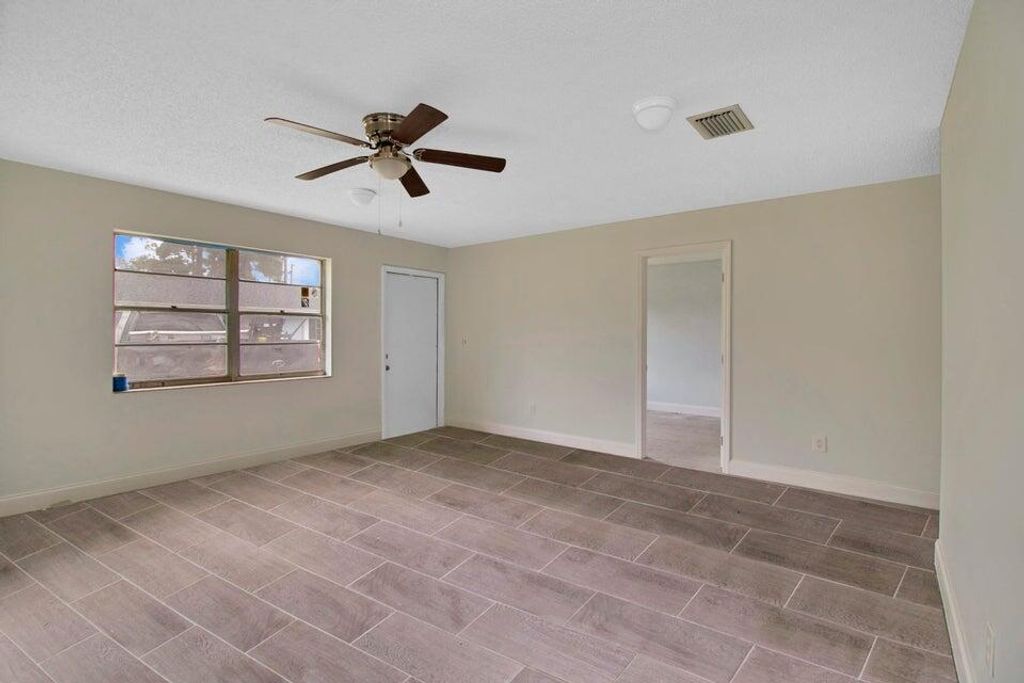 Photo of 3050 Martin Avenue, Greenacres, FL 33463 (MLS # R11147239)