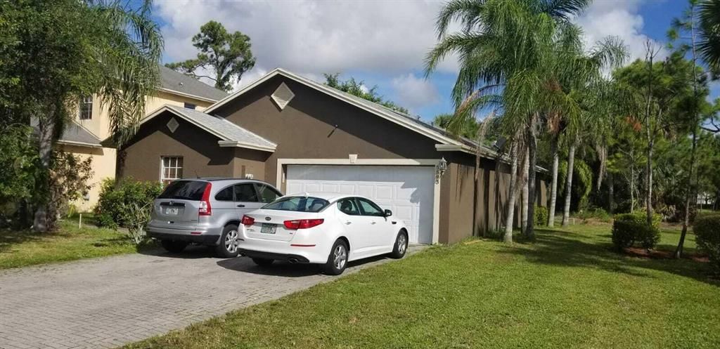 Photo of 5593 Rambler Rose Way, West Palm Beach, FL 33415 (MLS # R10742933)