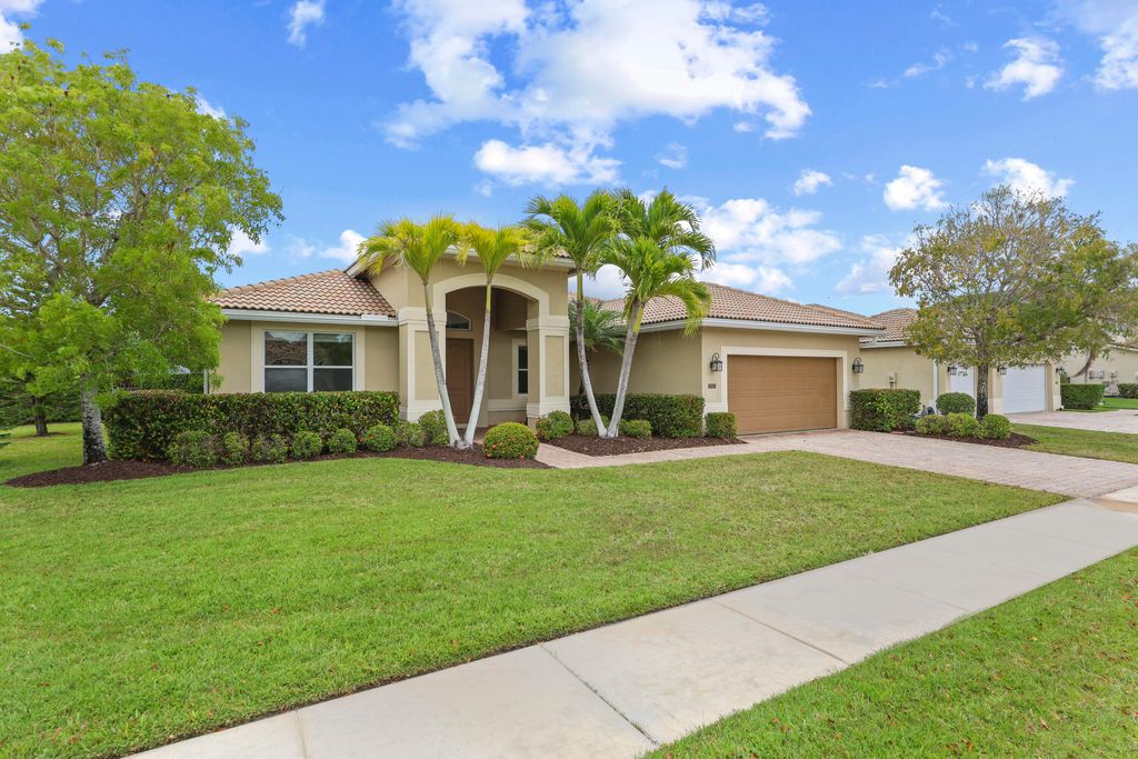 Photo of 9387 Silent Oak Circle, Wellington, FL 33411 (MLS # B26021270)