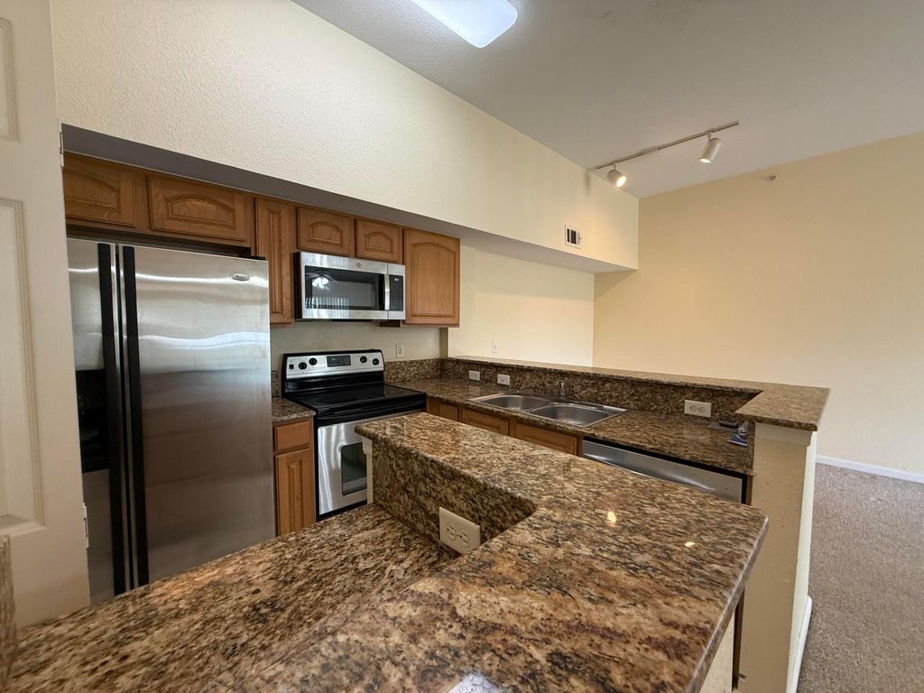 Photo of 231 SW Palm Drive #305, Port Saint Lucie, FL 34986 (MLS # R11163547)