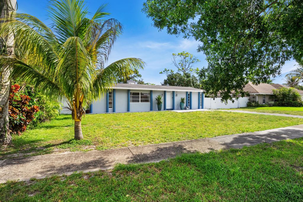 Photo of 5833 Fair Green Road, West Palm Beach, FL 33417 (MLS # B26041910)
