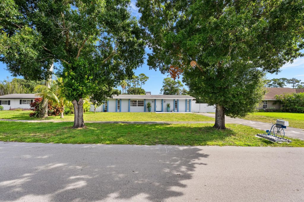 Photo of 5833 Fair Green Road, West Palm Beach, FL 33417 (MLS # B26041910)