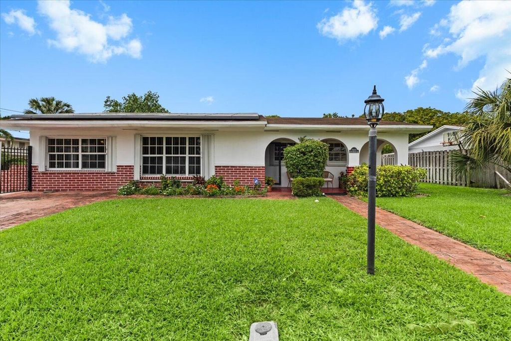 Photo of 1091 NW 46th Avenue, Lauderhill, FL 33313 (MLS # B26011808)