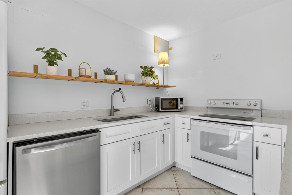 Photo of 608 6th Terrace, Palm Beach Gardens, FL 33418 (MLS # R11140316)