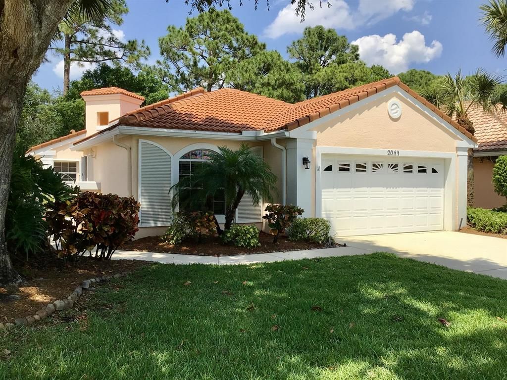 Photo of 2053 SW Olympic Club Terrace, Palm City, FL 34990 (MLS # R10709067)
