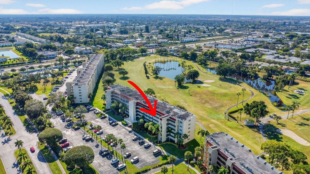Photo of 3871 Via Poinciana #407, Lake Worth, FL 33467 (MLS # B26080868)