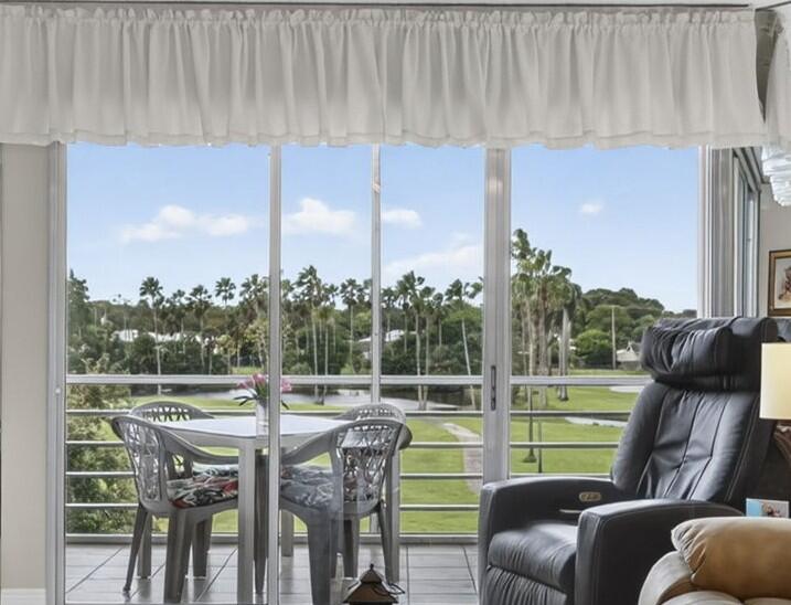 Photo of 3871 Via Poinciana #407, Lake Worth, FL 33467 (MLS # B26080868)