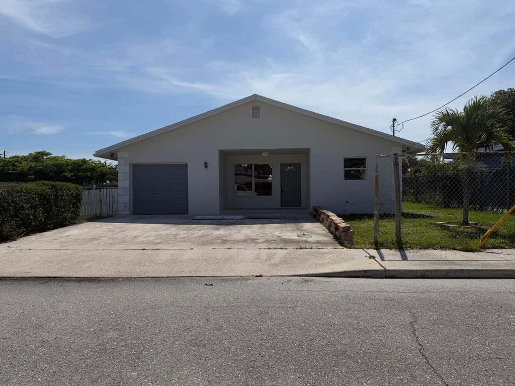 Photo of 1418 K St, Lake Worth Beach, FL 33460 (MLS # B26066061)