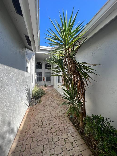 Photo of 5190 SABAL GARDENS Lane #6, Boca Raton, FL 33487 (MLS # B26082846)