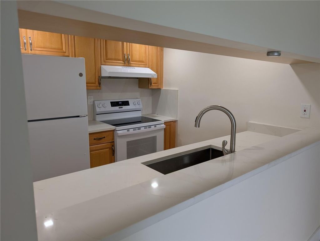 Photo of 6040 N Shakerwood Circle #106, Tamarac, FL 33319 (MLS # F10525083)