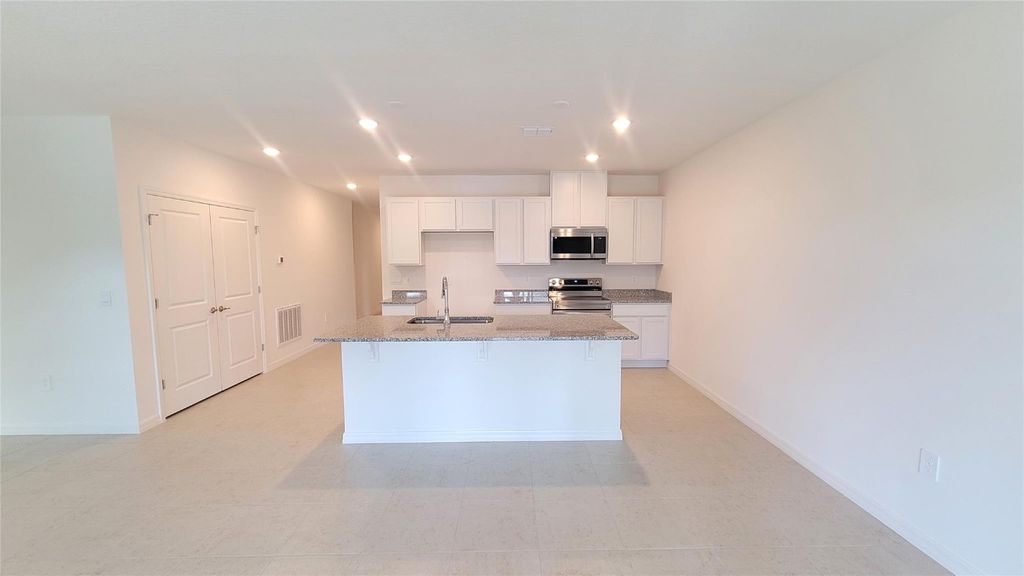 Photo of 582 SE Essex Drive, Port Saint Lucie, FL 34984 (MLS # F10463955)