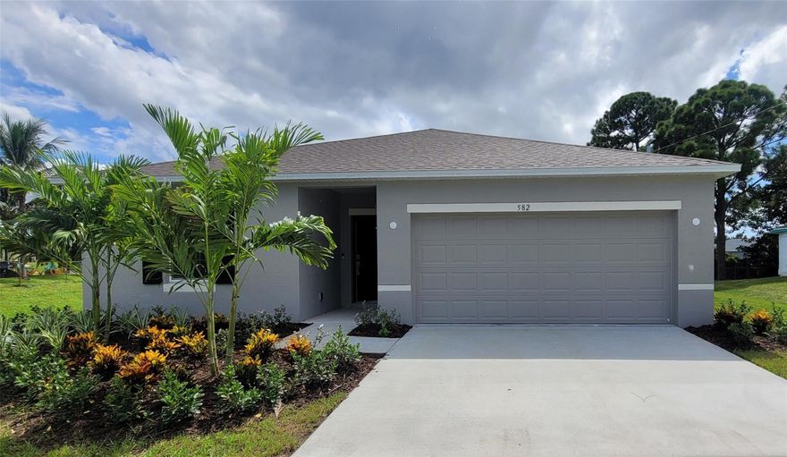 New Construction Move-in Ready. This charming Florida-style home features 4 bedrooms and 2 bathrooms, all on one floor, perfect for easy living. With upgraded roof sheathing, the home is built to last. Inside, you'll find upgraded lever door hardware that adds a modern touch throughout. The spacious kitchen is enhanced with granite countertops, providing both functionality and style, while the master bath and secondary bath feature luxurious granite countertops and finishes.

Ceramic tile flooring extends throughout the living areas, with plush carpeting in the bedrooms for comfort. The master bath boasts a beautiful tile shower, and the second bath includes a convenient tile tub/shower combo. For added convenience and privacy, horizontal cordless blinds adorn the windows.