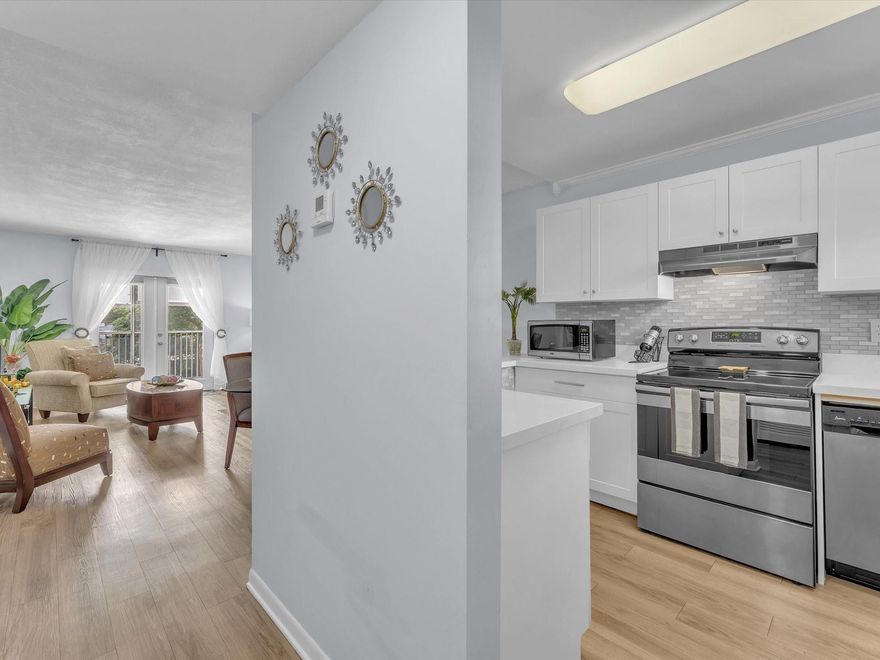 Remodeled 1 bedroom and 1.5 bathrooms with hurricane impact windows, modern kitchen with quartz countertops, open living area, and stunning lake view. Move-in ready! Enjoy amenities including pool, clubhouse, and fitness center in 55+ community.