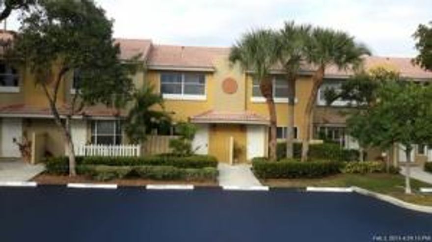 This is not a short sale. Gorgeous Townhouse in gated Intracoastal community. Features include an open concept kitchen with breakfast bar and sliders leading to fenced patio, a large tiled living room with half bath downstairs, two master suites upstairs with wood flooring and ample closet space. The community has a pool. All Information recorded in the MLS is intended to be accurate but cannot be guaranteed, buyer advised to verify. Sold As-Is.