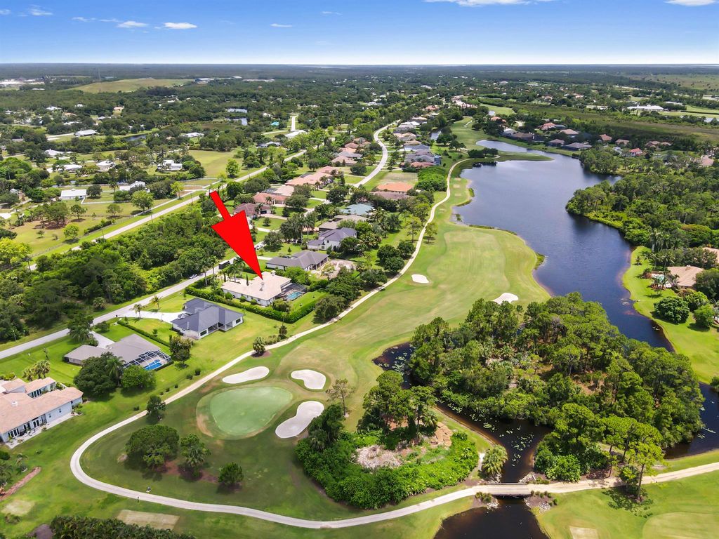 Photo of 908 SW Squire Johns Lane, Palm City, FL 34990 (MLS # R11101386)