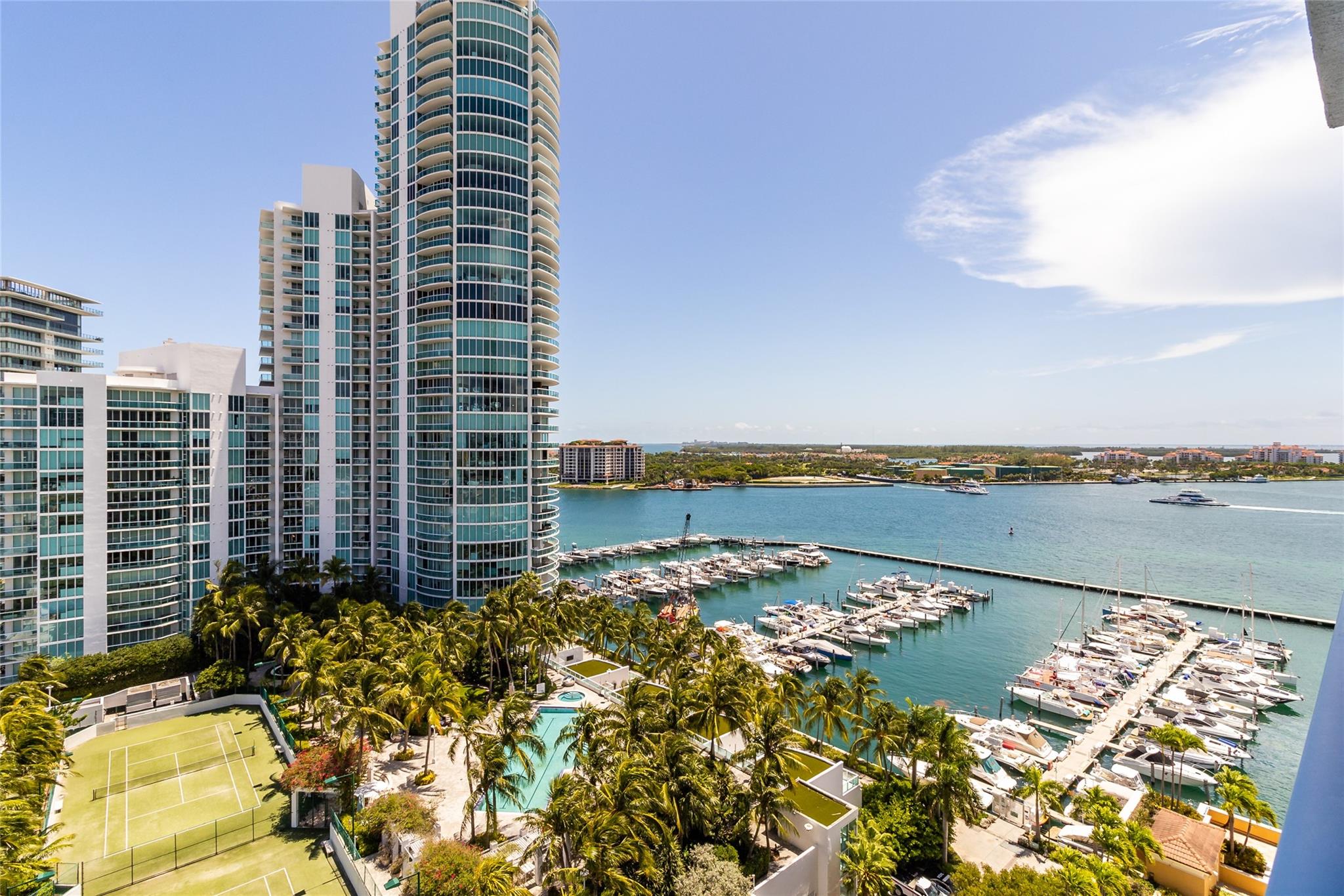 Beautiful, updated, light-filled 2 bedroom corner featuring a thoughtfully designed layout with special designer touches. Ocean and bay views out your 2 balconies. One of a kind home office space, built-in shelving, wine fridge and more. The Yacht Club at Portofino is a luxury high rise featuring pool, hot tub, gym tennis, doorman and more. Located in South Beach's vibrant, yet serene, South of Fifth neighborhood with top restaurants, bay walk, pier, parks and the beach out your front door.