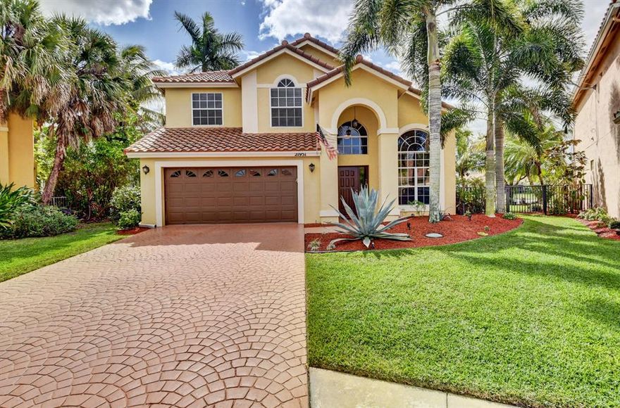 LOOK NO MORE!!!!
Fabulous pie-shaped cul-de-sac lake lot home in west Boca Raton with A rated schools! A wonderful family has been extremely happy here, now is your turn. Imagine the pool parties with your own private rock waterfall!!
This 4 bedroom 3 bath home, has a full bath and one bedroom downstairs, currently being used as an office but could be perfect for guests.
Plenty of natural light through out.
Best of all, BRAND NEW ROOF!!  Reach out for more details and don't miss out!
Dryer in the laundry room is excluded from the purchase.