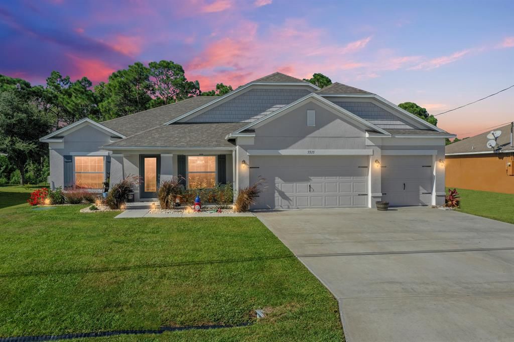 Photo of 5515 NW Whitecap Road, Port Saint Lucie, FL 34986 (MLS # R10755047)