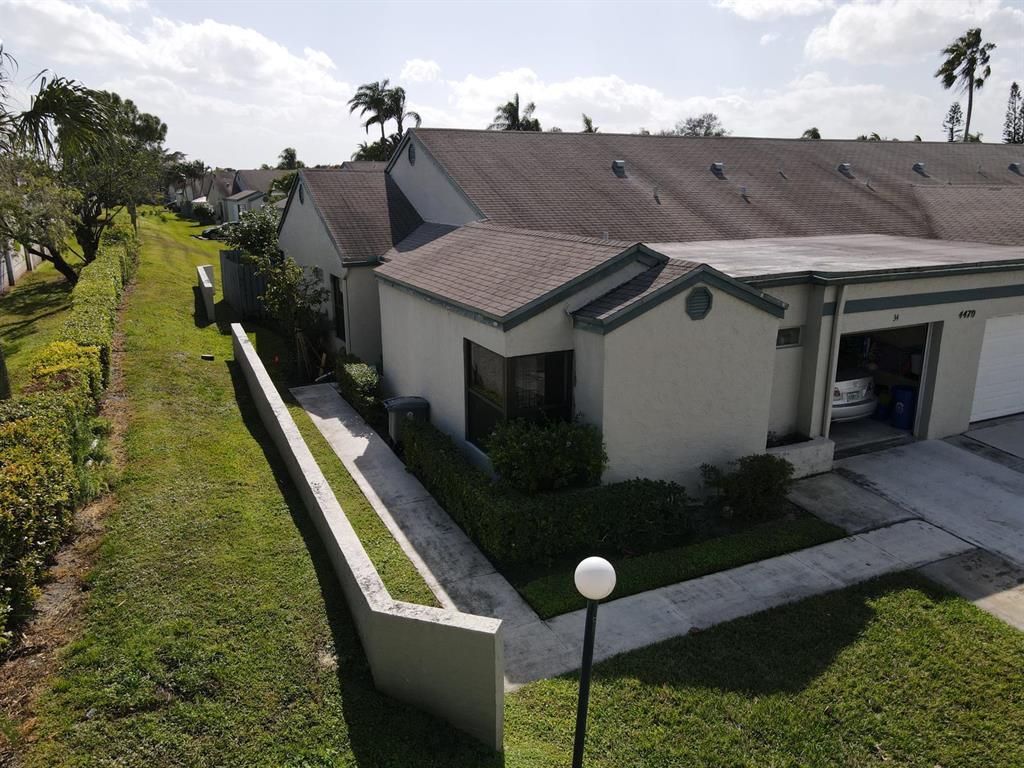 **This beautiful well maintained 3 bedroom 2 bathroom CORNER Villa which is move-in ready.** Ceramic tile although out the property, IMPACT WINDOWS, ( Except Sliding door)The kitchen has stainless steel appliances with modernized cabinetry, quartz countertops and complementing backsplash. Master bedroom with a big walk-in closet, newly renovated master bathroom with dual sink vanity, Quartz and beautiful shower!! bathrooms and Kitchen remodeled in 2020!! Large screened patio for entertaining and relaxing. This unit also has a one car garage and the driveway can fit two cars. A/c 2017, HOA is working to replace the roof this year. DO NOT CONVEY WASHER AND DRYER